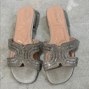 Rhinestone sandal with low heel. Gently worn